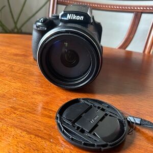 Nikon Black Digital Camera with Lens Cap